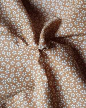Tissu coton orange petites fleurs blanches