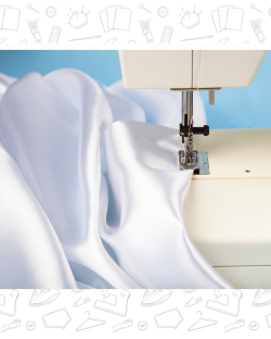 Tissu satin blanc cousu sur une machine a coudre familiale